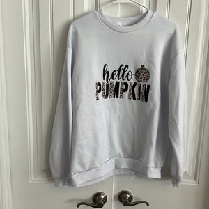 White fleece sweater. Cheetah print fall. Hello pumpkin. Fits like Large/XL